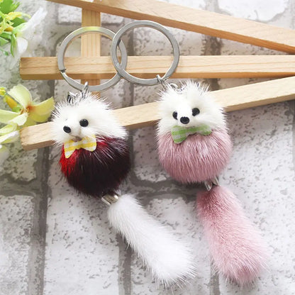 Fluffy keychain attached to a bag