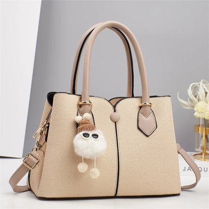 Shoulder bag open showing polyester lining and interior pockets