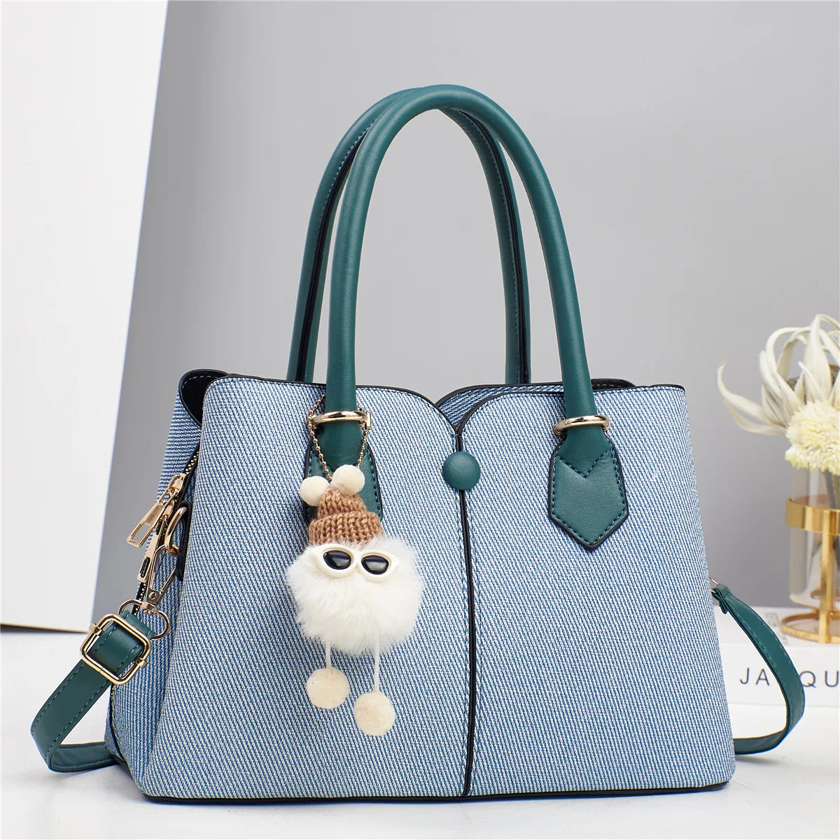 Square shoulder bag with flap pocket, side view
