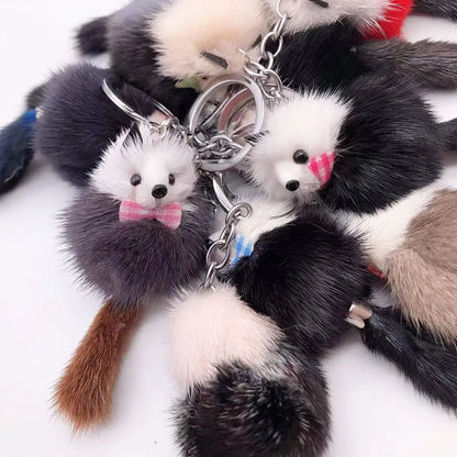 Fur pom keychain with O-shaped buckle, close-up